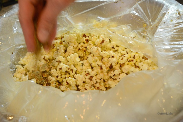 popcorn adding spices n